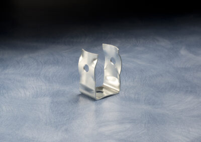 Metal component produced by stamping