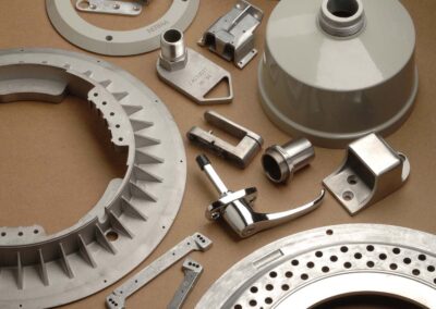 Collection of metal components produced by casting and forging components